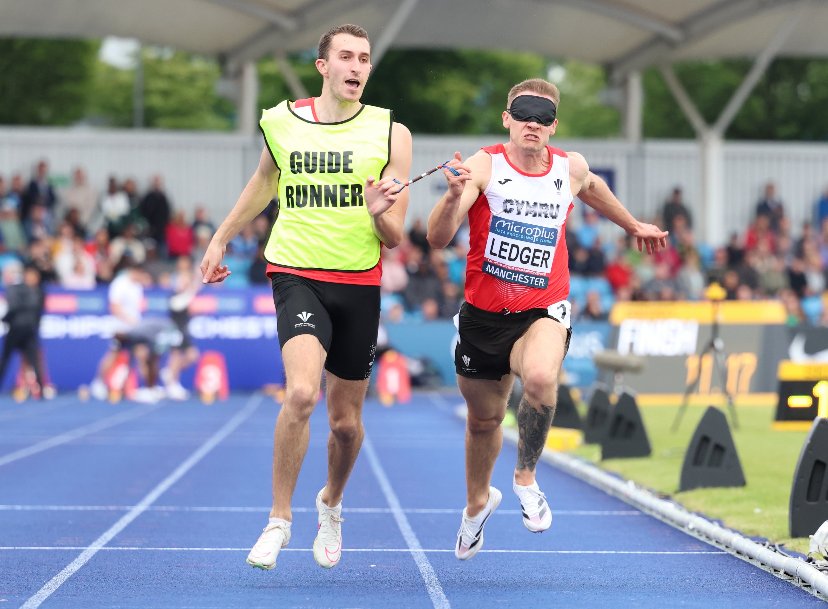 James Ledger and guide runner Greg